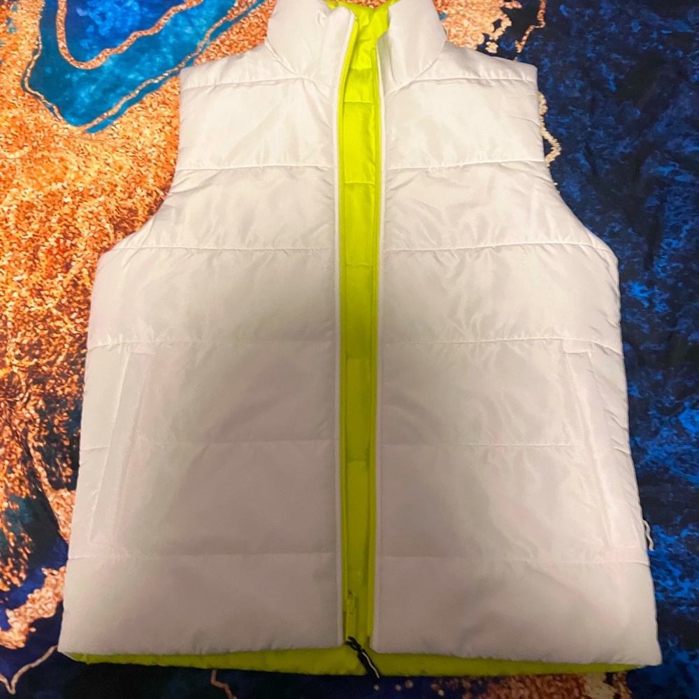 White vest with neon green inside